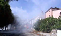 Sinop'ta otluk alanda çıkan yangın evin çatısına sıçradı